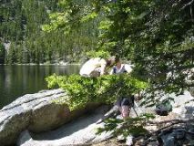 Nick fishing and Heather (hidden by the tree)