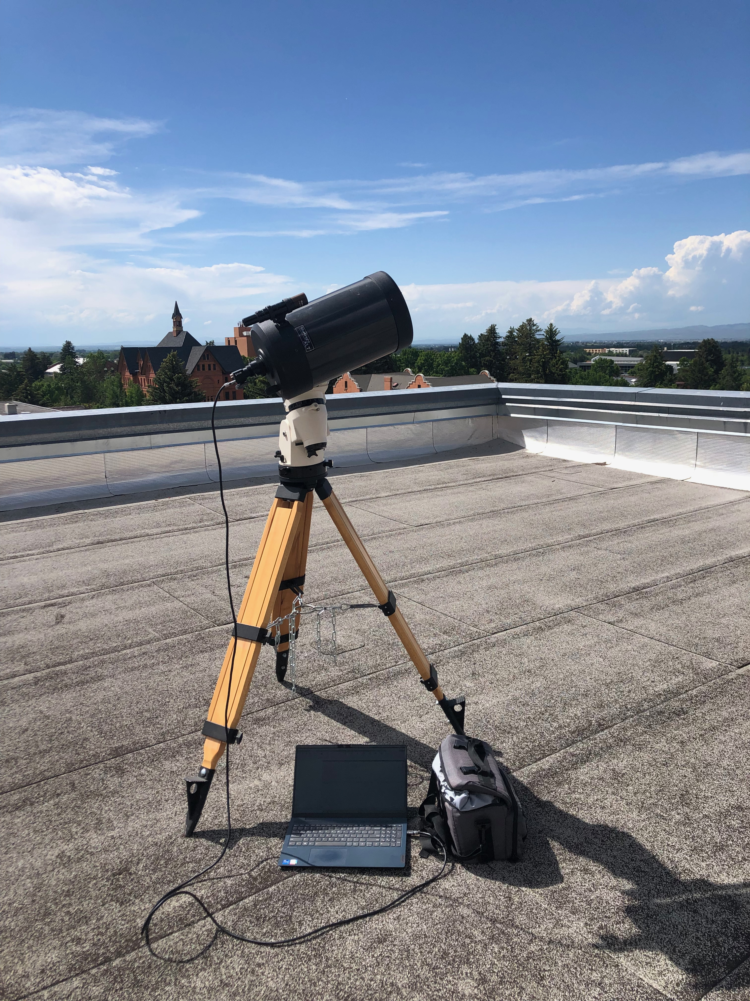 Our physical setup for taking measurements. The FLIR Blackfly monochrome polarization camera is mounted in the back of a 2m focal length telescope. The camera is connected to the computer and can be controlled through a Matlab script.